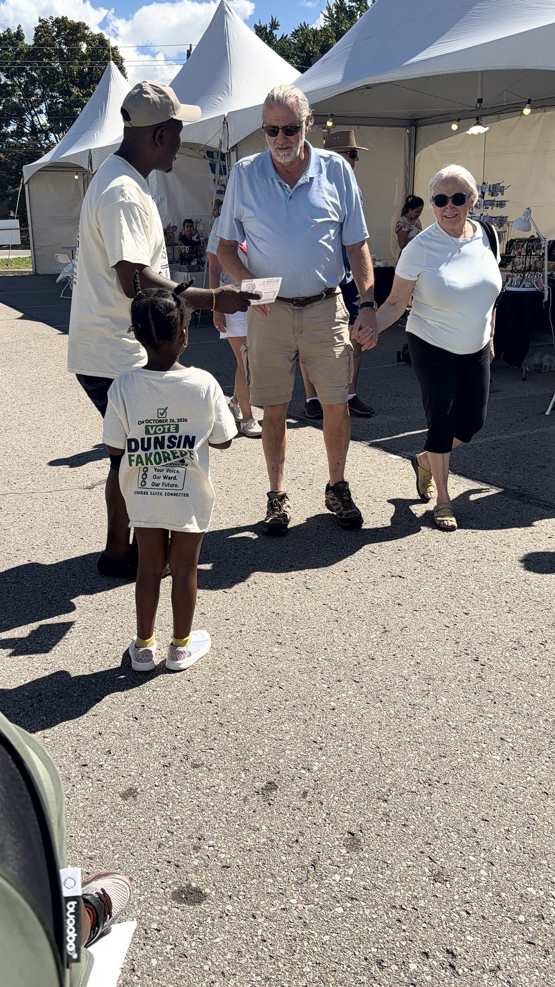 Dunsin Fakorede greeting attendees at the Niagara Greek Festival